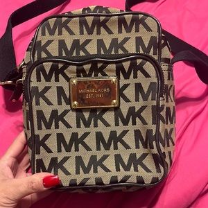 Michael Kors signature flight bag